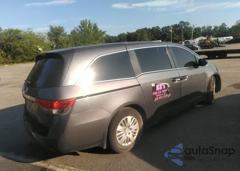 2014 Honda Odyssey Lx z USA, uszkodzony, nr VIN 5FNRL5H2XEB106627